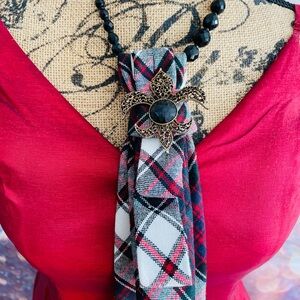 Upcycled necktie with vintage brooch and necklace